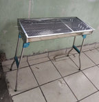 Asador de carbón portátil plegable